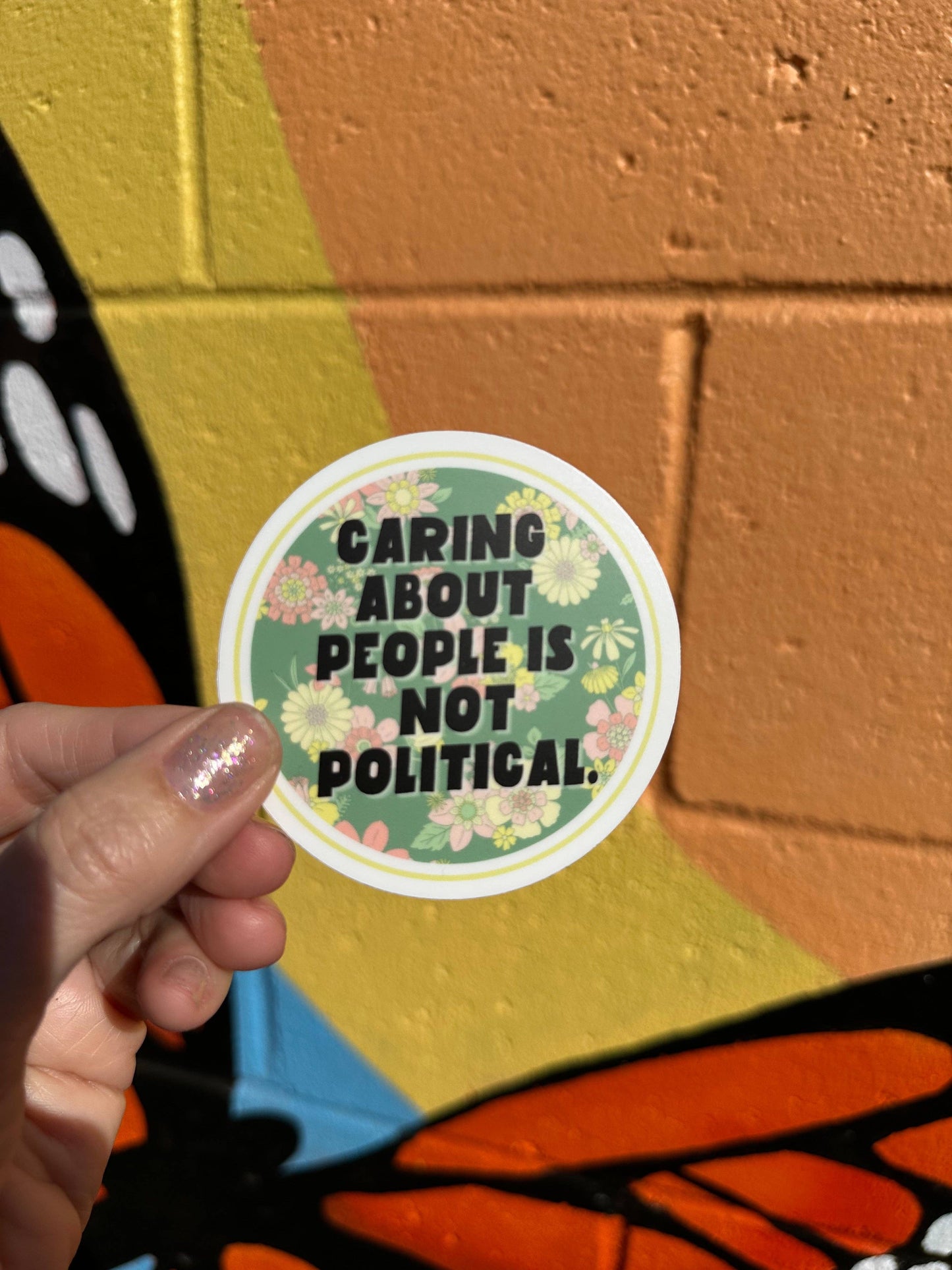Caring About People Is Not Political Sticker